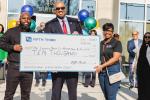 Fifth Third Chief Corporate Responsibility Officer Kala Gibson presents a $10,000 grant to The Country Meat Co. Marketplace.